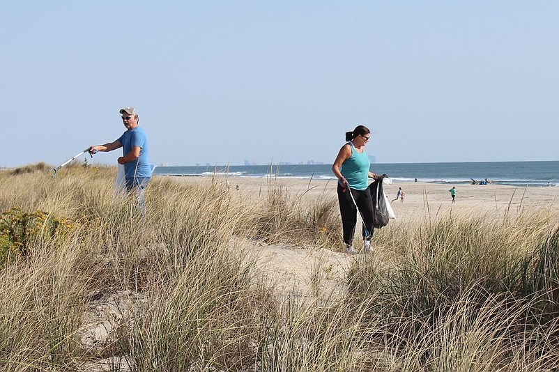 Volunteers remove litter from the beaches and dunes during the community cleanup on Oct. 12, 2024. (Photos courtesy of Sea Isle City)