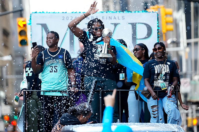 Jonquil Jones and the New York Liberty go up Broadway as fans cheer during the ticker-tape parade held in their honor, Thursday, October 24, 2024, in Manhattan. The Liberty won the WNBA Championship on Sunday.