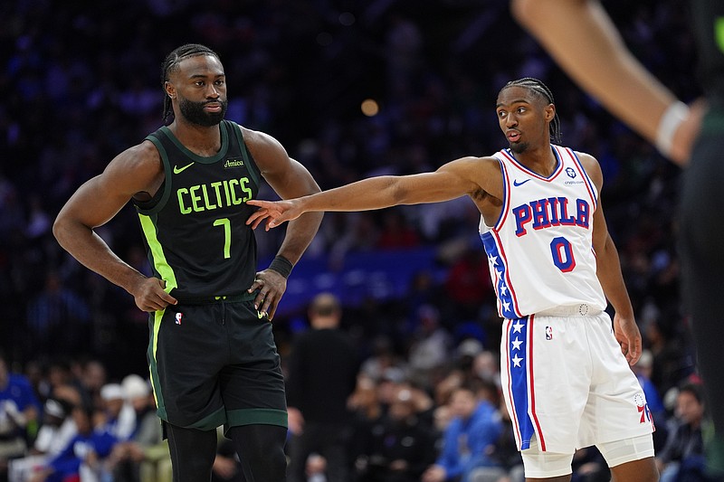 Feb 2, 2025; Philadelphia, Pennsylvania, USA; Philadelphia 76ers guard Tyrese Maxey (0) gestures to Boston Celtics forward Jaylen Brown (7) in the second quarter at Wells Fargo Center. Mandatory Credit: Kyle Ross-Imagn Images