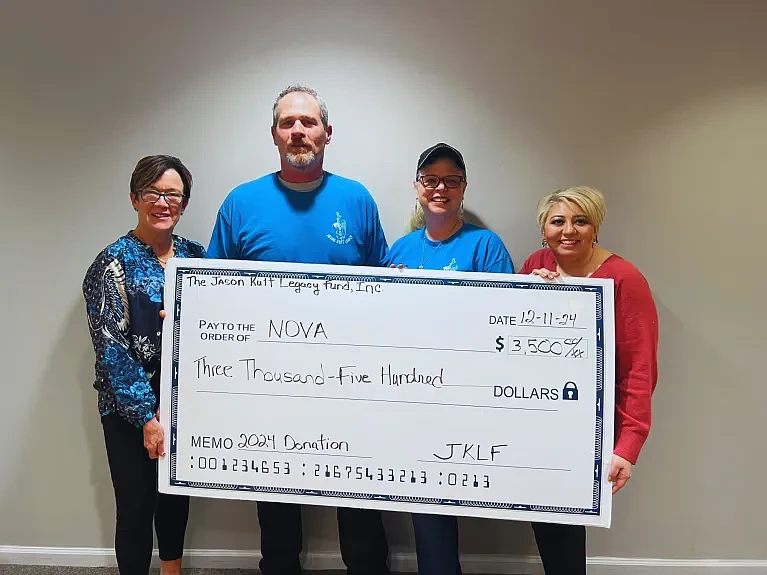 NOVA receives a $3,500 donation from the Kutt Family. From left are Penny Ettinger, executive director of NOVA; Ron and Dana Kutt, parents of Jason Kutt; and Angela McGettigan, senior director of Operations & Community Engagement for NOVA.)(Credit: NOVA)