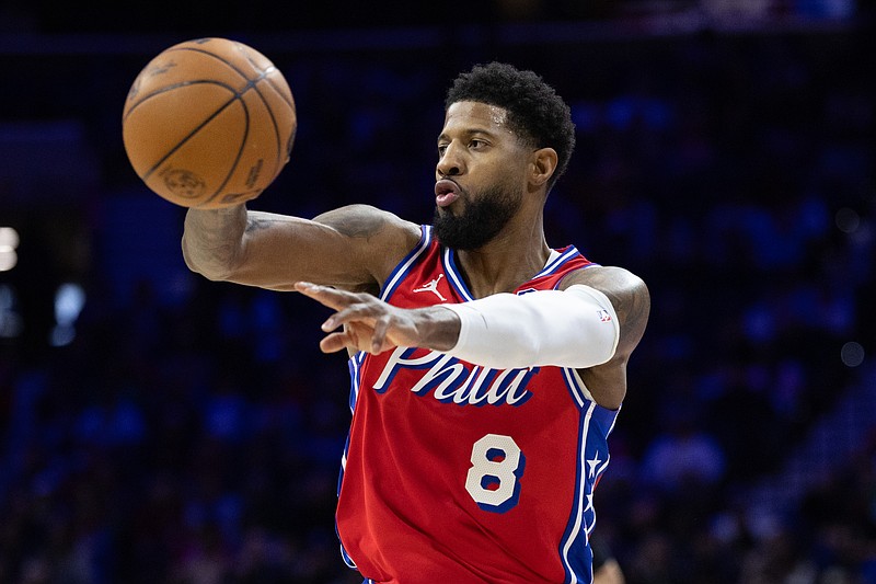 Jan 24, 2025; Philadelphia, Pennsylvania, USA; Philadelphia 76ers forward Paul George (8) passes the ball against the Cleveland Cavaliers during the second quarter at Wells Fargo Center. Mandatory Credit: Bill Streicher-Imagn Images