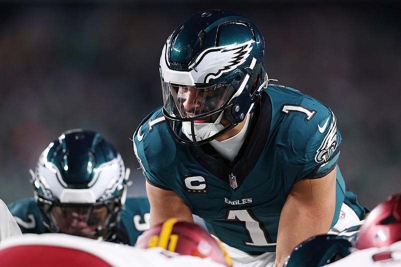 Jan 26, 2025; Philadelphia, PA, USA; Philadelphia Eagles quarterback Jalen Hurts (1) prepares to snap against the Washington Commanders during the second half in the NFC Championship game at Lincoln Financial Field. Mandatory Credit: Bill Streicher-Imagn Images