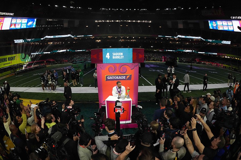 Feb 3, 2025; New Orleans, LA, USA; Philadelphia Eagles running back Saquon Barkley (26) is interviewed during Super Bowl LIX Opening Night at Ceasars Superdome. Mandatory Credit: Kirby Lee-Imagn Images