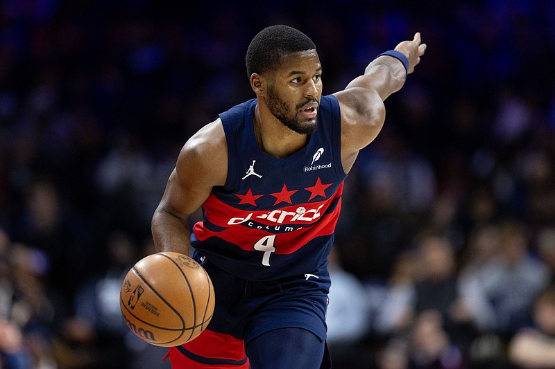 Jan 8, 2025; Philadelphia, Pennsylvania, USA; Washington Wizards guard Jared Butler (4) controls the ball against the Philadelphia 76ers during the second quarter at Wells Fargo Center. Mandatory Credit: Bill Streicher-Imagn Images