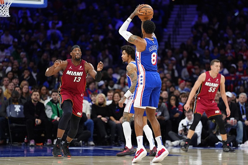 Feb 5, 2025; Philadelphia, Pennsylvania, USA; Philadelphia 76ers forward Paul George (8) shoots the ball against the Miami Heat in the second quarter at Wells Fargo Center. Mandatory Credit: Kyle Ross-Imagn Images