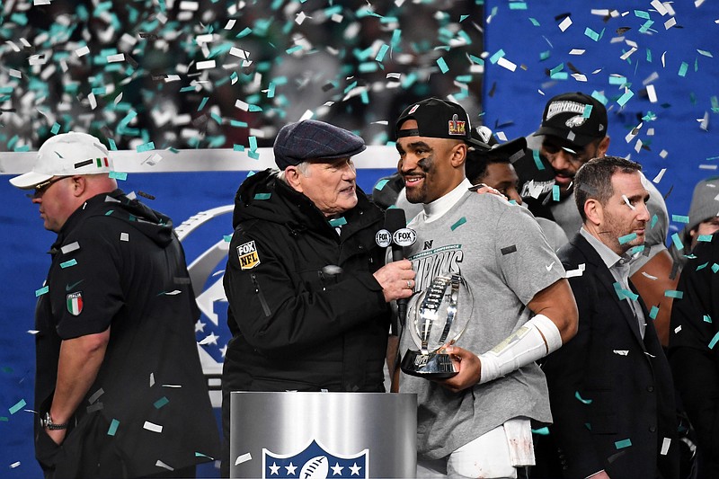 Jan 26, 2025; Philadelphia, PA, USA; Terry Bradshaw interviews Philadelphia Eagles quarterback Jalen Hurts (1) after winning the NFC Championship game against the Washington Commanders at Lincoln Financial Field. Mandatory Credit: Eric Hartline-Imagn Images