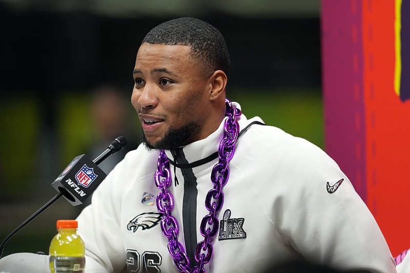 Feb 3, 2025; New Orleans, LA, USA; Philadelphia Eagles running back Saquon Barkley speaks during Super Bowl LIX Opening Night at Ceasars Superdome. Mandatory Credit: James Lang-Imagn Images