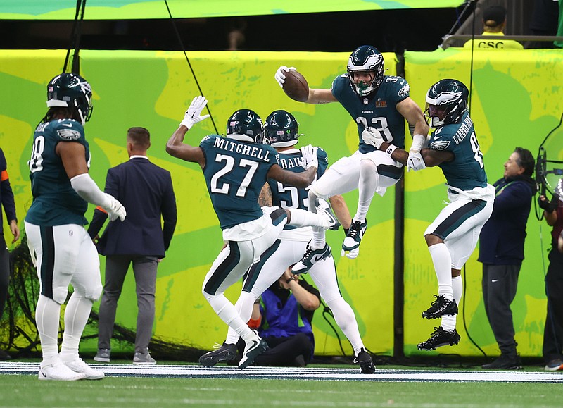 Feb 9, 2025; New Orleans, LA, USA; Philadelphia Eagles cornerback Cooper DeJean (33) celebrates after returning an interception for a touchdown against the Kansas City Chiefs in the second quarter in Super Bowl LIX at Ceasars Superdome. Mandatory Credit: Mark J. Rebilas-Imagn Images