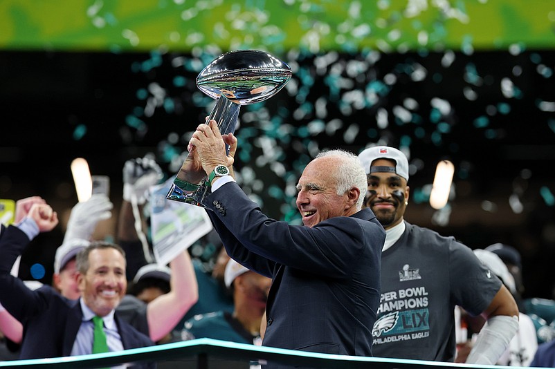 Feb 9, 2025; New Orleans, LA, USA; Philadelphia Eagles general manager Howie Roseman holds up the Vince Lombardi Trophy as he celebrates after winning against Kansas City Chiefs in Super Bowl LIX at Caesars Superdome. Mandatory Credit: Geoff Burke-Imagn Images