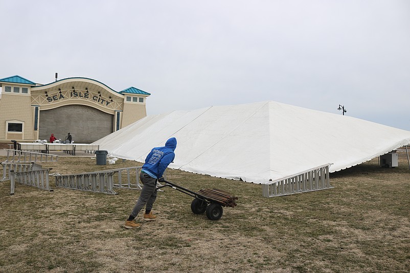 One of the heated tents is erected in Excursion Park for the Mike's Seafood Run-Walk for Autism this weekend.