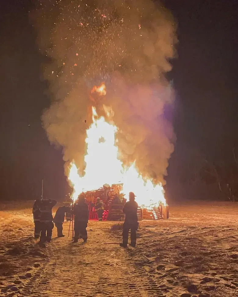 Members of the Barren Hill Fire Company kept watch over the ‘Winter Warm-up’ bonfire at the Highlands Mansion and Gardens historic site in Fort Washington on Jan. 25, 2025. (Credit: Highlands Mansion and Gardens)