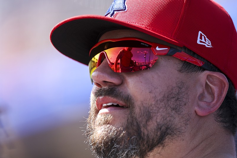 Mar 4, 2024; Dunedin, Florida, USA;  Philadelphia Phillies designated hitter Kyle Schwarber (12) looks on from the dugout against the Toronto Blue Jays in the sixth inning at TD Ballpark. Mandatory Credit: Nathan Ray Seebeck-USA TODAY Sports