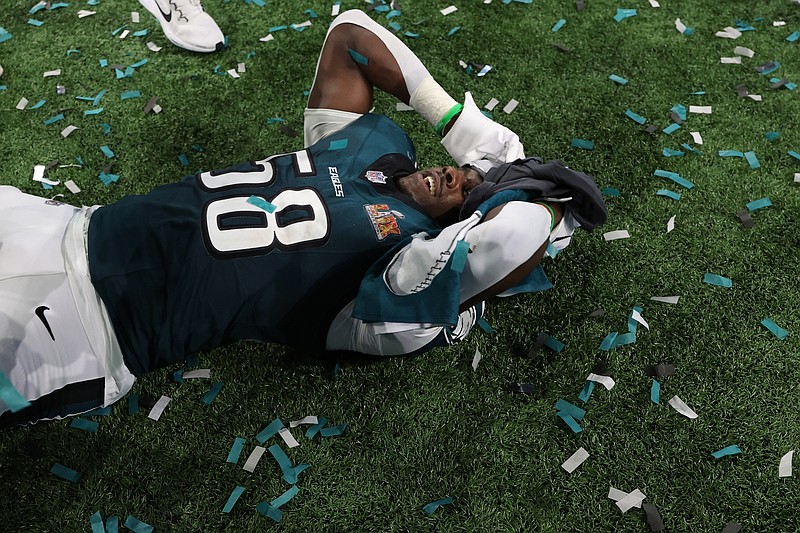 Feb 9, 2025; New Orleans, LA, USA; Philadelphia Eagles linebacker Jalyx Hunt (58) celebrates on the field after Super Bowl LIX against the Kansas City Chiefs at Caesars Superdome. Mandatory Credit: Geoff Burke-Imagn Images