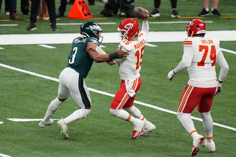 Feb 9, 2025; New Orleans, LA, USA; Philadelphia Eagles linebacker Nolan Smith Jr. (3) makes a tackle on Kansas City Chiefs quarterback Patrick Mahomes (15) during the second quarter in Super Bowl LIX at Caesars Superdome. Mandatory Credit: Kirby Lee-Imagn Images