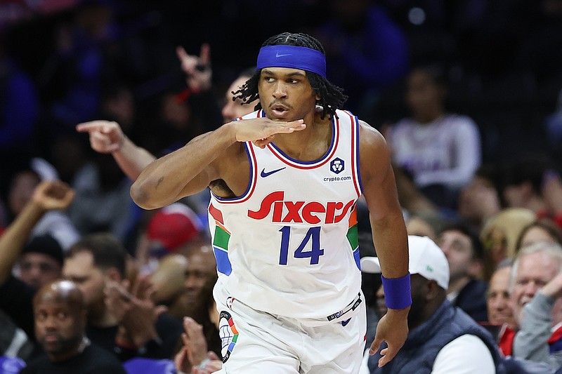 Jan 29, 2025; Philadelphia, Pennsylvania, USA; Philadelphia 76ers guard Ricky Council IV (14) reacts to his three pointer against the Sacramento Kings during the second quarter at Wells Fargo Center. Mandatory Credit: Bill Streicher-Imagn Images