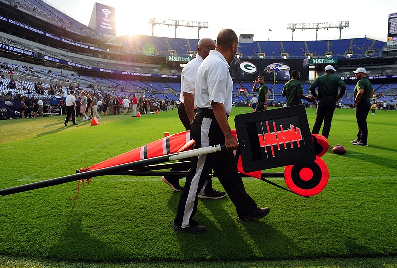 Aug 15, 2019; Baltimore, MD, USA; Chain crew members walk on the field prior to the game between the Green Bay Packers and Baltimore Ravens at M&T Bank Stadium. Mandatory Credit: Evan Habeeb-USA TODAY Sports