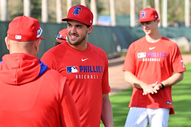 Feb 12, 2025; Clearwater, FL, USA; Philadelphia Phillies pitcher Aaron Nola (27) prepares to warm up during a spring training workout at Carpenter Complex Mandatory Credit: Jonathan Dyer-Imagn Images