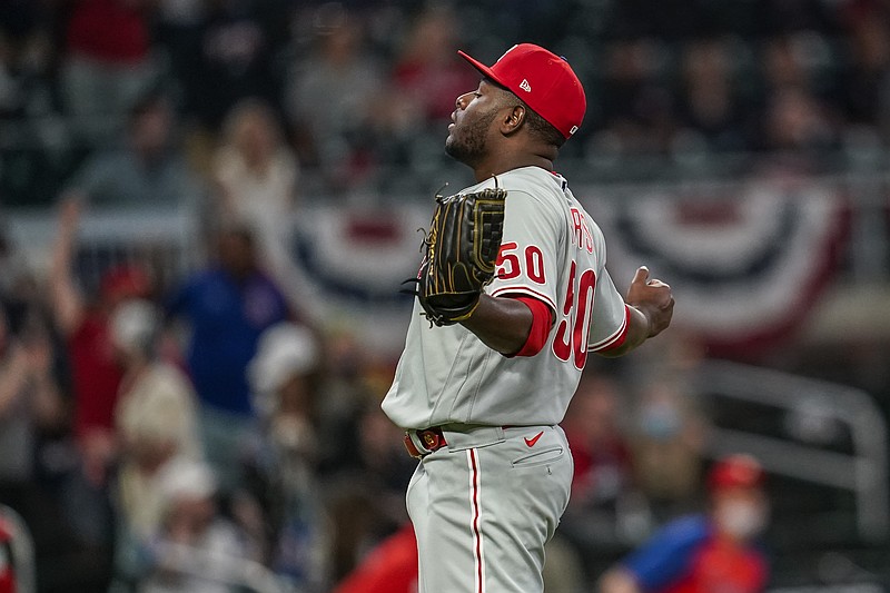 Apr 11, 2021; Cumberland, Georgia, USA; Philadelphia Phillies relief pitcher Hector Neris (50) reacts after defeating  the Atlanta Braves at Truist Park. Mandatory Credit: Dale Zanine-USA TODAY Sports