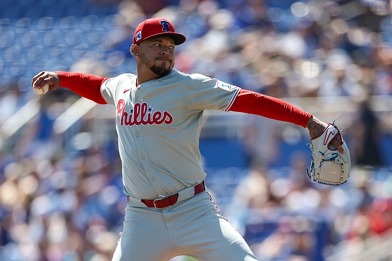 Mar 2, 2025; Dunedin, Florida, USA; Philadelphia Phillies pitcher Taijuan Walker (99) throws a pitch against the Toronto Blue Jays in the first inning during spring training at TD Ballpark. Mandatory Credit: Nathan Ray Seebeck-Imagn Images