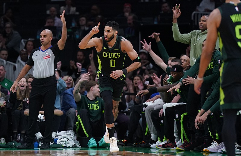 Mar 6, 2025; Boston, Massachusetts, USA; Boston Celtics forward Jayson Tatum (0) reacts after his three point basket against the Philadelphia 76ers in the first quarter at TD Garden. Mandatory Credit: David Butler II-Imagn Images