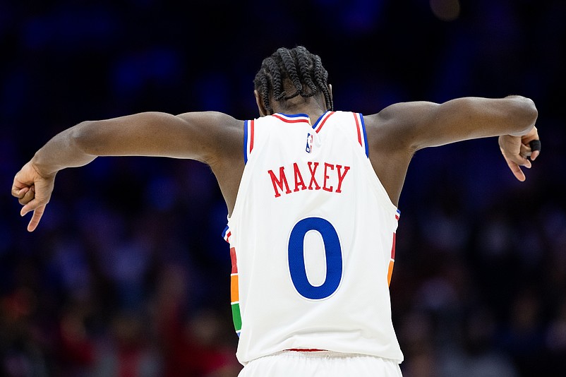 Mar 1, 2025; Philadelphia, Pennsylvania, USA; Philadelphia 76ers guard Tyrese Maxey (0) reacts to an and one score against the Golden State Warriors during the third quarter at Wells Fargo Center. Mandatory Credit: Bill Streicher-Imagn Images