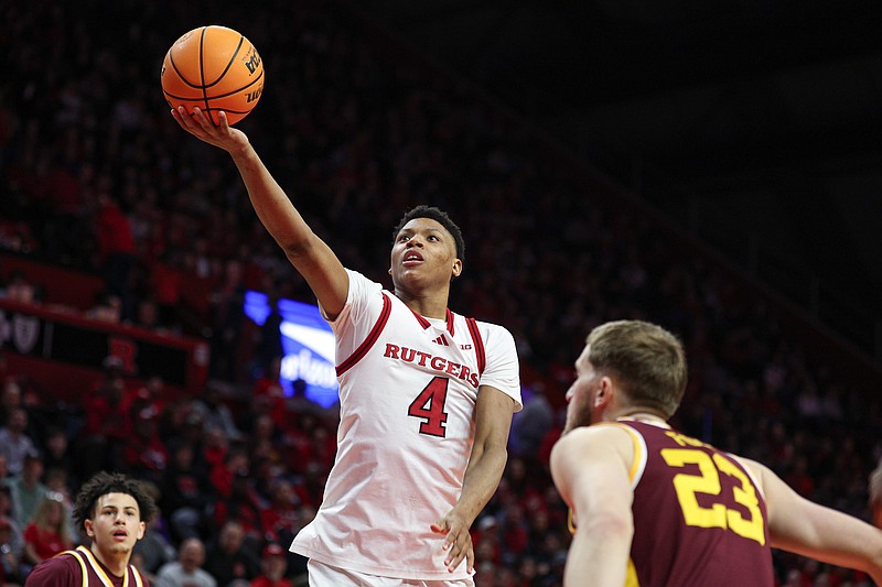 Mar 9, 2025; Piscataway, New Jersey, USA; Rutgers Scarlet Knights guard Ace Bailey (4) goes to the basket during the second half against Minnesota Golden Gophers forward Parker Fox (23) at Jersey Mike's Arena. Mandatory Credit: Vincent Carchietta-Imagn Images