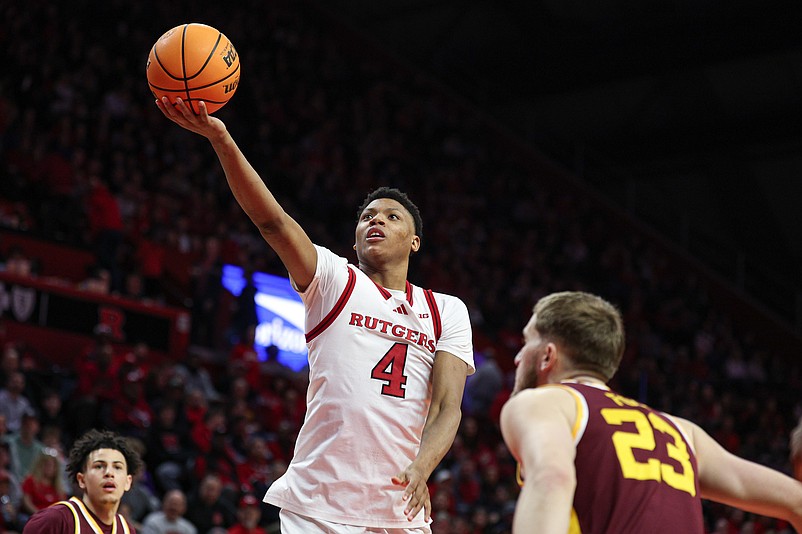 Mar 9, 2025; Piscataway, New Jersey, USA; Rutgers Scarlet Knights guard Ace Bailey (4) goes to the basket during the second half against Minnesota Golden Gophers forward Parker Fox (23) at Jersey Mike's Arena. Mandatory Credit: Vincent Carchietta-Imagn Images