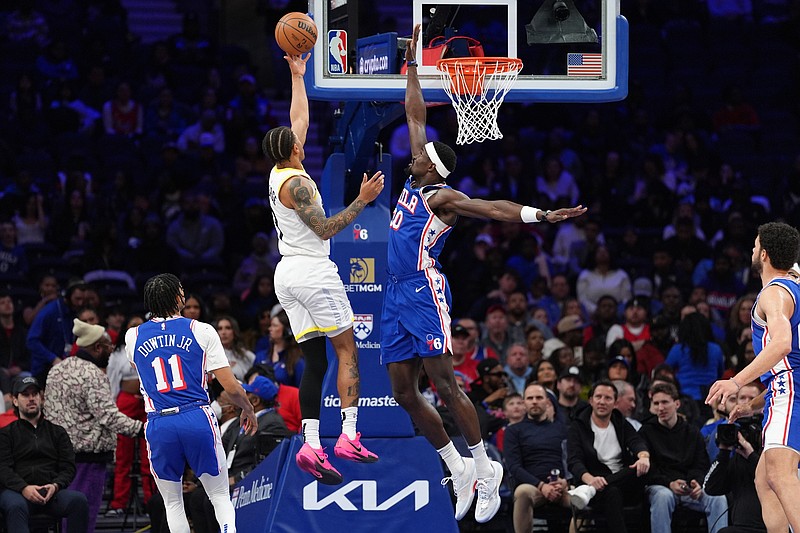 Mar 9, 2025; Philadelphia, Pennsylvania, USA; Utah Jazz guard Keyonte George (3) drives to shoot against Philadelphia 76ers center Adem Bona (30) in the second quarter at Wells Fargo Center. Mandatory Credit: Kyle Ross-Imagn Images