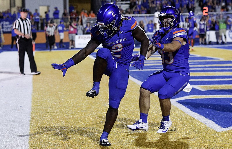 Sep 28, 2024; Boise, Idaho, USA; Boise State Broncos running back Ashton Jeanty (2) strikes the Heisman pose during the second half against the Washington State Cougars at Albertsons Stadium. Boise State defeats Washington State 45-24. Mandatory Credit: Brian Losness-Imagn Images..