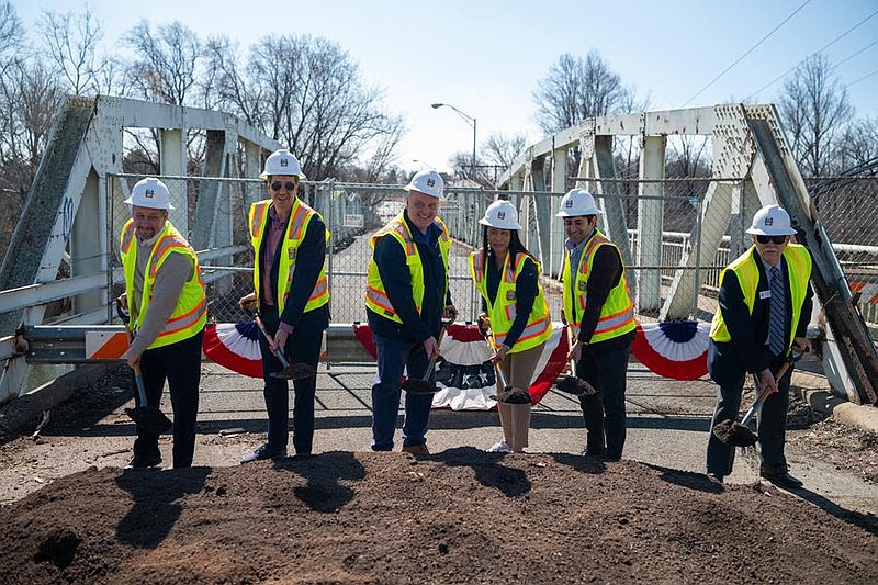 State Reps Paul Friel and Joe Ciresi, Montgomery County Commissioners Tom DiBello, Jamila Winder, and Neil Makhija, and Pottstown Borough Council President Dan Weand break ground on construction of the Keim Street Bridge in Pottstown. (Credit: Montgomery County).