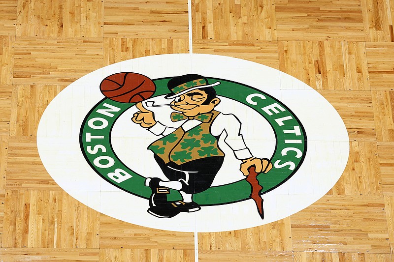 Apr 3, 2022; Boston, Massachusetts, USA; The Boston Celtics logo is seen on the parquet floor at center court before the game between the Boston Celtics and the Washington Wizards at TD Garden. Mandatory Credit: Winslow Townson-USA TODAY Sports