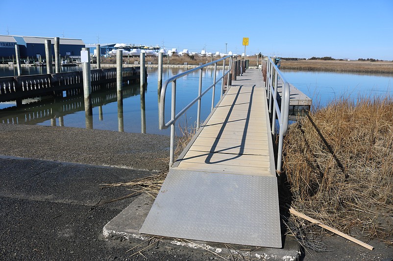 A metal walkway leading to the boat ramp is bent and is a possible tripping hazard, Donald Sparks says.