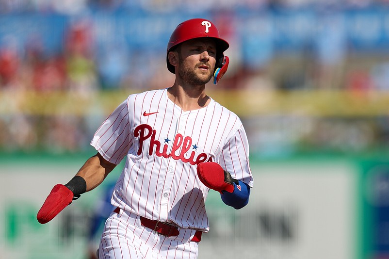 Mar 8, 2025; Clearwater, Florida, USA; Philadelphia Phillies shortstop Trea Turner (7) reaches third base against the Toronto Blue Jays in the sixth inning during spring training at BayCare Ballpark. Mandatory Credit: Nathan Ray Seebeck-Imagn Images