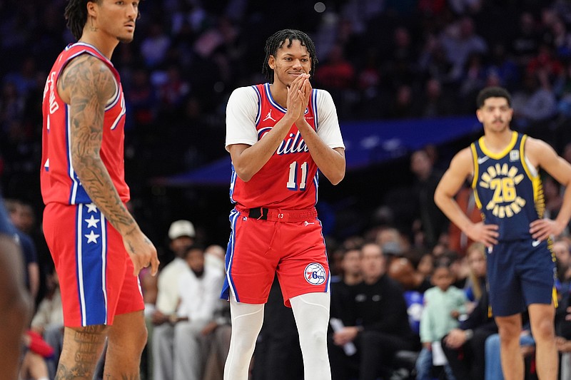 Mar 14, 2025; Philadelphia, Pennsylvania, USA; Philadelphia 76ers guard Jeff Dowtin Jr (11) reacts against the Indiana Pacers in the second quarter at Wells Fargo Center. Mandatory Credit: Kyle Ross-Imagn Images