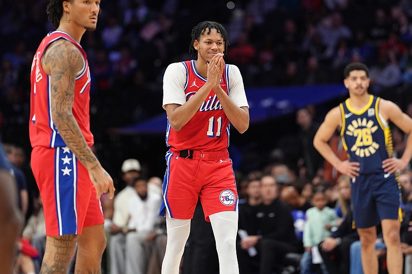 Mar 14, 2025; Philadelphia, Pennsylvania, USA; Philadelphia 76ers guard Jeff Dowtin Jr (11) reacts against the Indiana Pacers in the second quarter at Wells Fargo Center. Mandatory Credit: Kyle Ross-Imagn Images