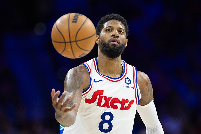 Mar 1, 2025; Philadelphia, Pennsylvania, USA; Philadelphia 76ers forward Paul George (8) catches a ball against the Golden State Warriors during the third quarter at Wells Fargo Center. Mandatory Credit: Bill Streicher-Imagn Images