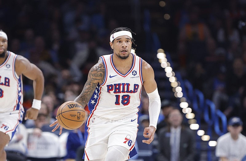 Mar 19, 2025; Oklahoma City, Oklahoma, USA; Philadelphia 76ers forward Chuma Okeke (18) dribbles down the court against the Oklahoma City Thunder during the second quarter at Paycom Center. Mandatory Credit: Alonzo Adams-Imagn Images