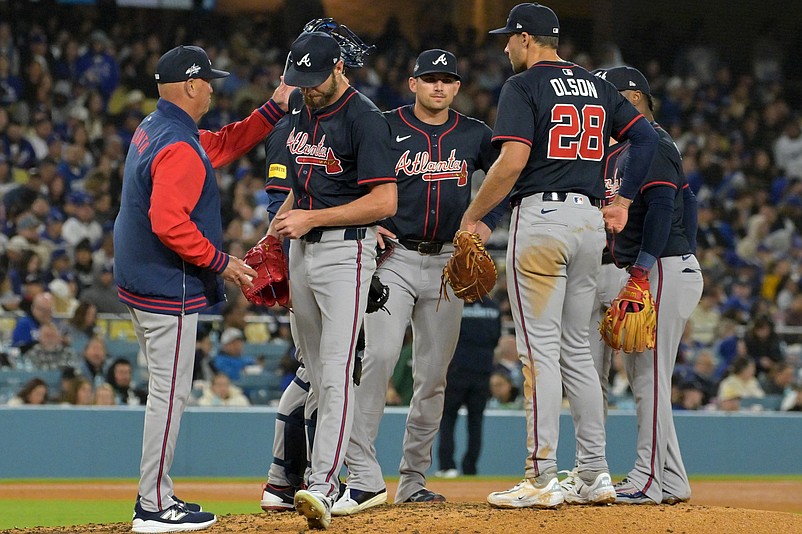 Apr 1, 2025; Los Angeles, California, USA;  Atlanta Braves manager Brian Snitker (43) pulls starting pitcher Chris Sale (51) in the sixth inning against the Los Angeles Dodgers at Dodger Stadium. Mandatory Credit: Jayne Kamin-Oncea-Imagn Images