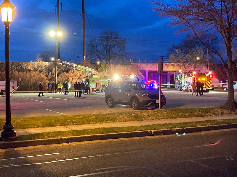Emergency personnel climb to the train tracks near Bristol station after reports of a fatality after a southbound Amtrak train struck several people on the tracks.