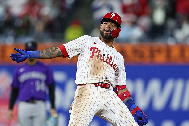 Apr 2, 2025; Philadelphia, Pennsylvania, USA; Philadelphia Phillies shortstop Edmundo Sosa (33) reacts after his 2 RBI double during the eighth inning against the Colorado Rockies at Citizens Bank Park. Mandatory Credit: Bill Streicher-Imagn Images