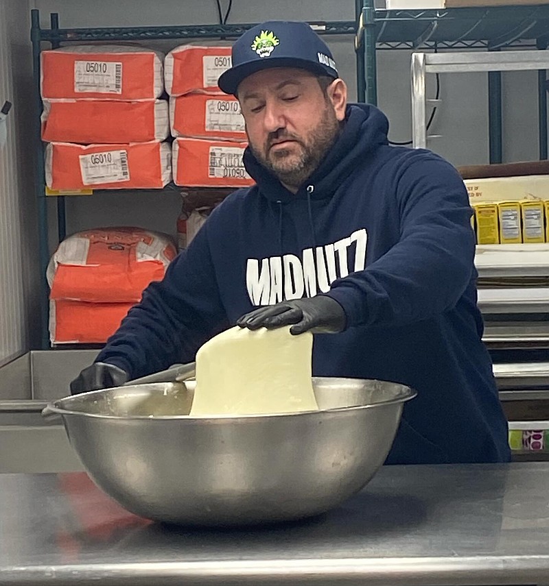 MAD MUTZ/Michael Hauke makes a batch of fresh mozzarella sticks.