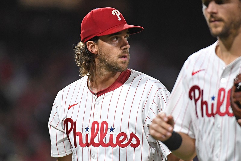 Sep 23, 2024; Philadelphia, Pennsylvania, USA; Philadelphia Phillies pitcher Aaron Nola (27) walks off the field after the fifth inning against the Chicago Cubs at Citizens Bank Park. Mandatory Credit: Eric Hartline-Imagn Images