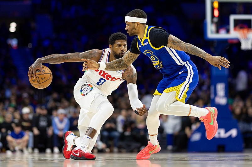 Mar 1, 2025; Philadelphia, Pennsylvania, USA; Philadelphia 76ers forward Paul George (8) dribbles the ball against Golden State Warriors guard Gary Payton II (0) during the second quarter at Wells Fargo Center. Mandatory Credit: Bill Streicher-Imagn Images