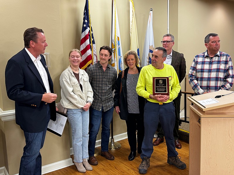 Mayor Patric Armstrong, right, honors retiring DPW Supervisor Chris Berenotto.
