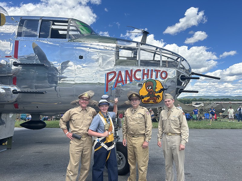 (From left) Col. Keith Seiwell, CEO of the General Carl Spaatz National USAAF Museum, 2024 Panchito winner Katie Wanner, Museum Director Chris Boswell and Museum Re-Enactor/Guide Tommy Rokita. (Credit: Katalinas Communications)