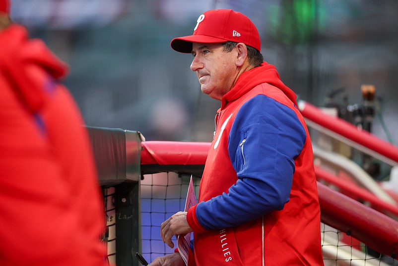 Apr 8, 2025; Atlanta, Georgia, USA; Philadelphia Phillies manager Rob Thomson (59) in the dugout against the Atlanta Braves in the second inning at Truist Park. Mandatory Credit: Brett Davis-Imagn Images