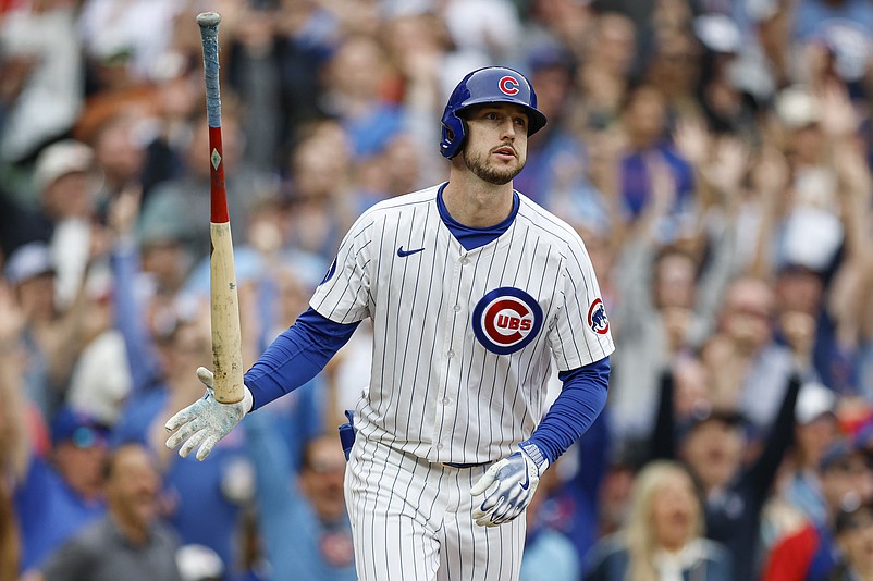 Apr 18, 2025; Chicago, Illinois, USA; Chicago Cubs outfielder Kyle Tucker (30) watches his two-run home run against the Arizona Diamondbacks during the eighth inning at Wrigley Field. Mandatory Credit: Kamil Krzaczynski-Imagn Images
