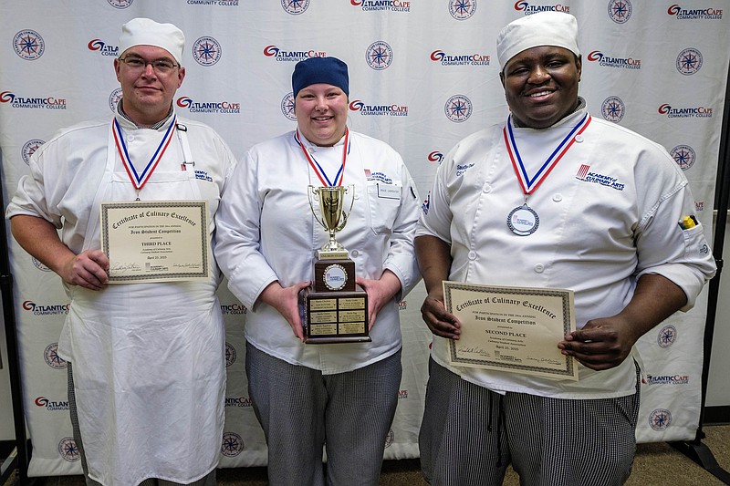 Austin Krautwald, left, winner Grace Carpenter and Saudley Delphin. (Photo by Craig Matthews)