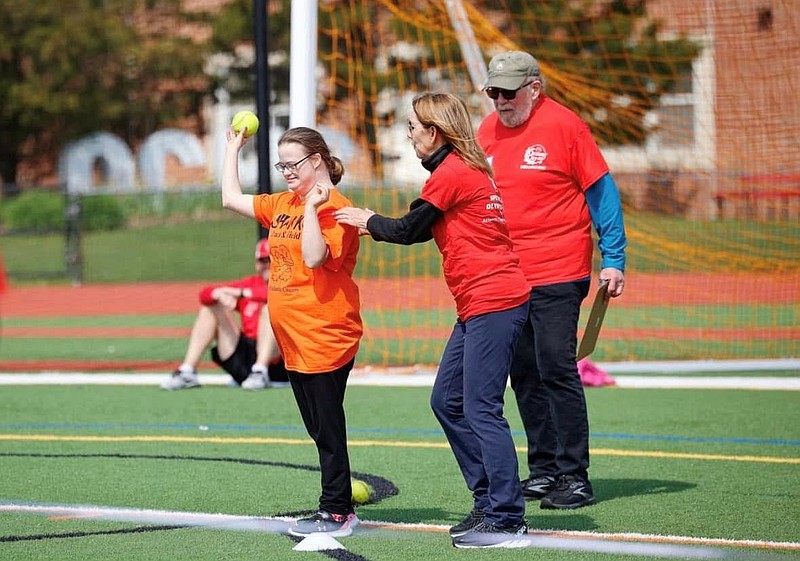 A Special Olympics athlete competes in one of the events under the guidance of volunteers. (Photo courtesy of Ocean City)