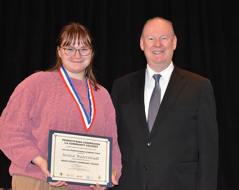 Jessica Waterstradt, of Quakertown, is congratulated by Dr. Patrick M. Jones, President & CEO of Bucks County Community College, after she was named to the All-Pennsylvania Academic Team by the Pennsylvania Commission for Community Colleges. (Credit: BCCC)